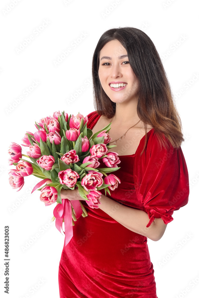 Beautiful young Asian woman with flowers on white background. International Women's Day celebration Beautiful young Asian woman with flowers on white background. International Women's Day celebration