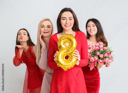 Beautiful women with bouque...