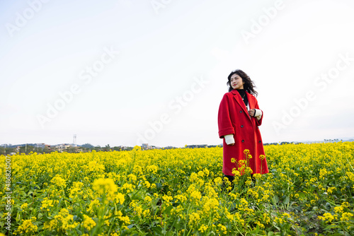 woman in a field of flowers