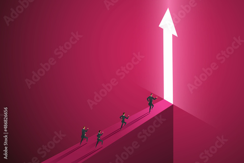Group businesspeople run go to front of bright big shining arrow.
