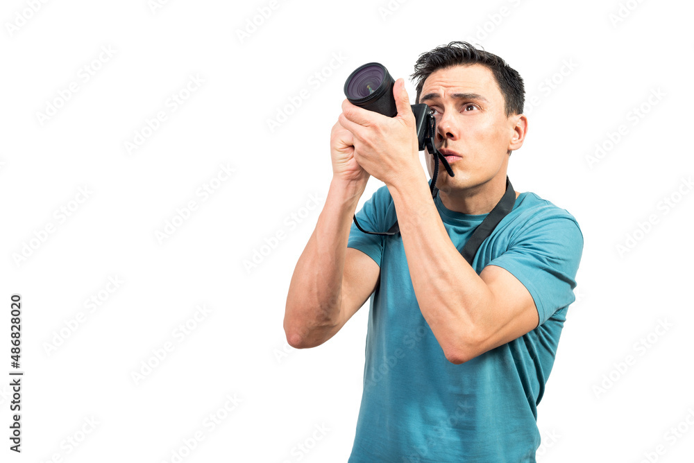 Attentive photographer taking pictures on photo camera Attentive photographer taking pictures on photo camera