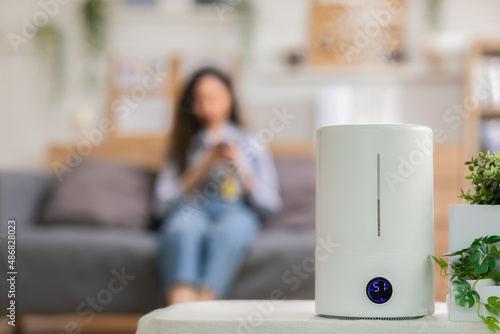 White water air humidifier create fog for purify and moisture the air and moisturizing the skin.Water mist antibacteria and aromatherapy in the air for good sinus health.Wellness modern life humidify photo