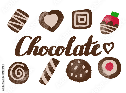 Set of chocolate sweets and chocolate lettering isolated on white