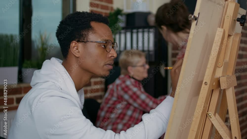 Portrait of young student using pencil on canvas to draw vase, learning creative skills in art class. Artistic workshop to create artwork drawings with crafting equipment for educational growth. Portrait of young student using pencil on canvas to draw vase, learning creative skills in art class. Artistic workshop to create artwork drawings with crafting equipment for educational growth.