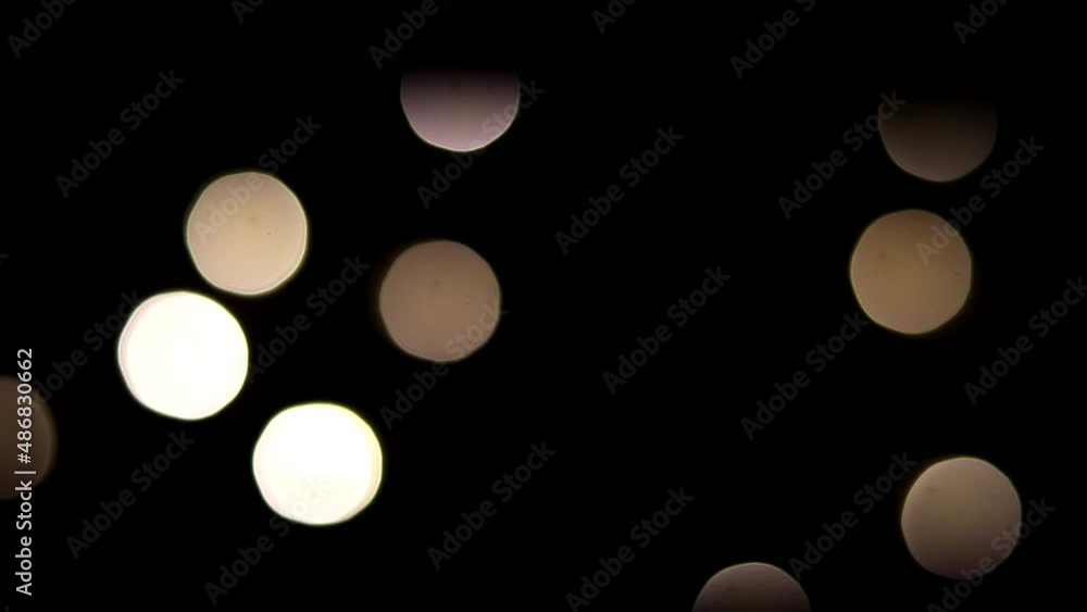 Lens light leaks flashing around making an elegant abstract background. blurred background on black background. Lens light leaks flashing around making an elegant abstract background. blurred background on black background.