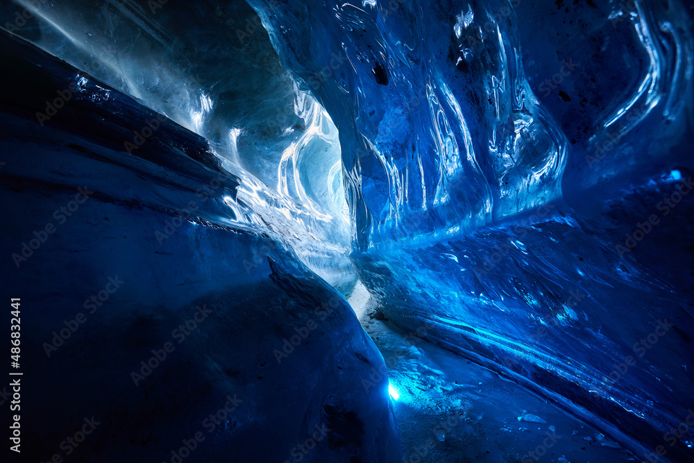 Landscape of amazing blue glacial ice cave Landscape of amazing blue glacial ice cave
