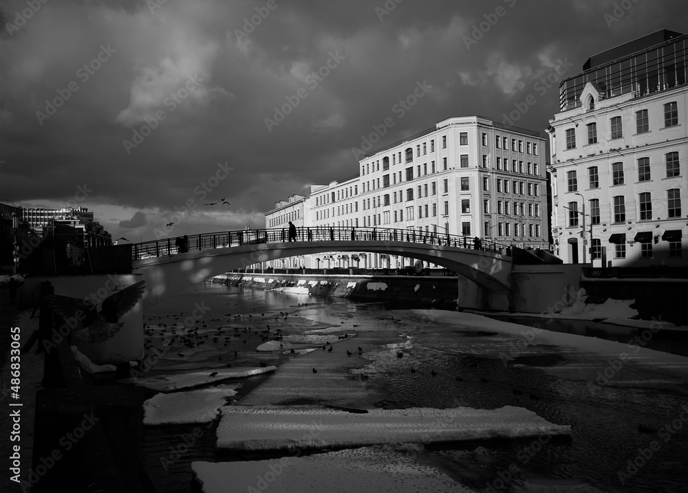 Black & white bridge over the Moscow river channel