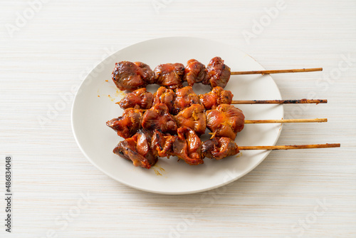 grilled chicken gizzard skewer yakitori serve in izakaya style photo