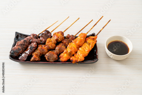 Japanese chicken grill or yakitori serve in izakaya style photo