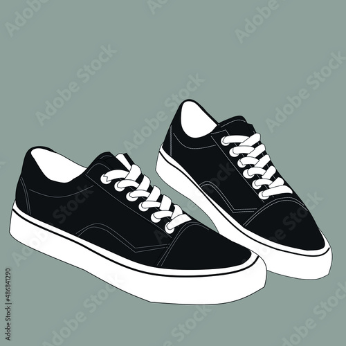 Dark blue sneakers with white laces on a gray background.