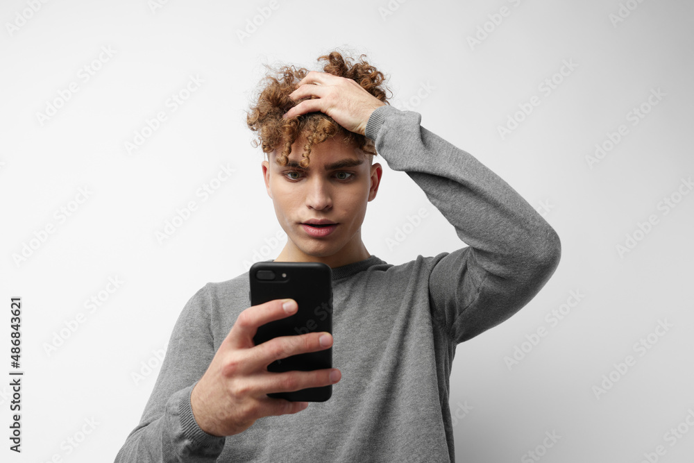 handsome guy technology with phone selfie Lifestyle unaltered handsome guy technology with phone selfie Lifestyle unaltered