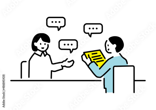 資料をもとに打ち合わせする二人のイラスト