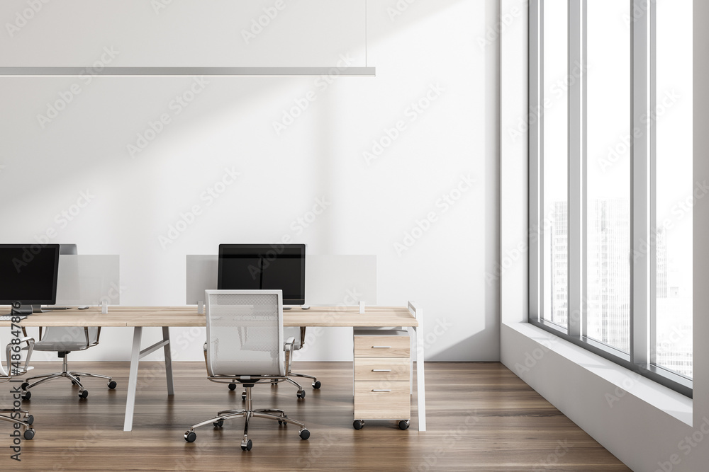 Office room interior with seats, table and computers, window with city view Office room interior with seats, table and computers, window with city view