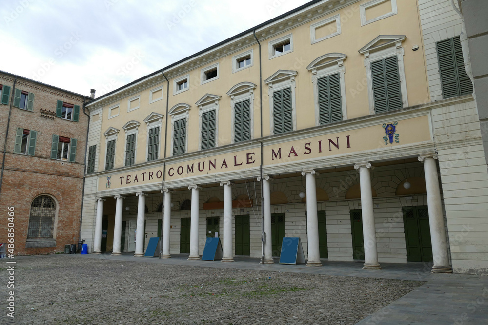 Masini municipal theater in Faenza, the facade with the yellow portico 