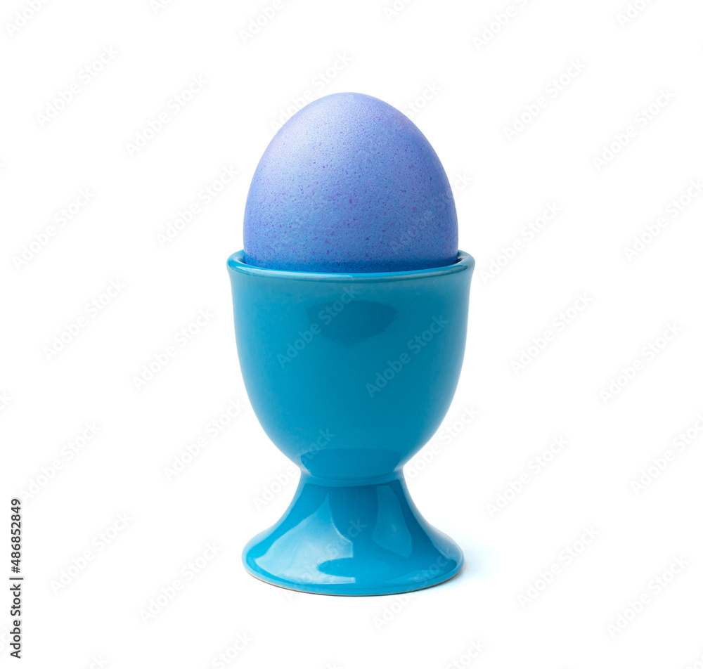 The Easter egg on the stand is isolated on a white background The Easter egg on the stand is isolated on a white background