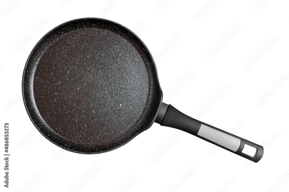 Black pancake pan with nonstick surface isolated on white background, close-up, top view. Black pancake pan with nonstick surface isolated on white background, close-up, top view.