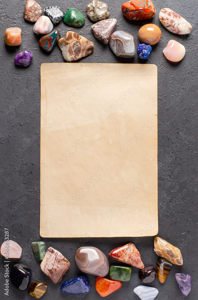 Premium Photo  Mineral stones and an old piece of paper black concrete  background the concept of using minerals in astrology and alternative  medicine copy space