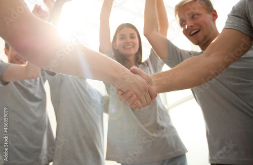 young people congratulating each other on the victory