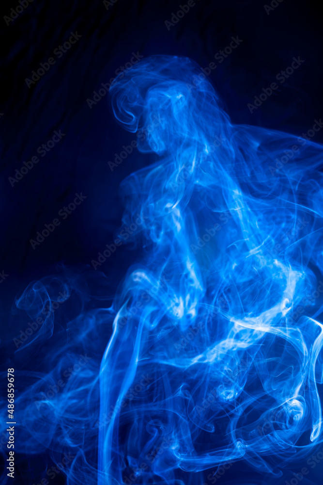 Blue smoke on black background. Blue smoke on black background.