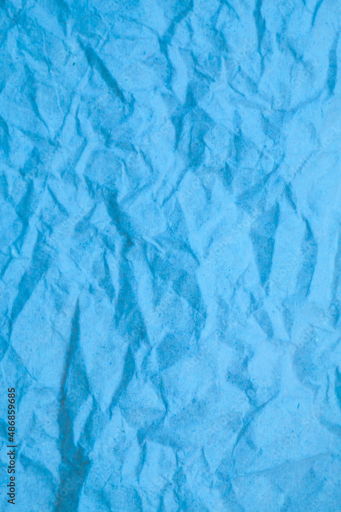 Blue crumpled paper background. Blue crumpled paper background.