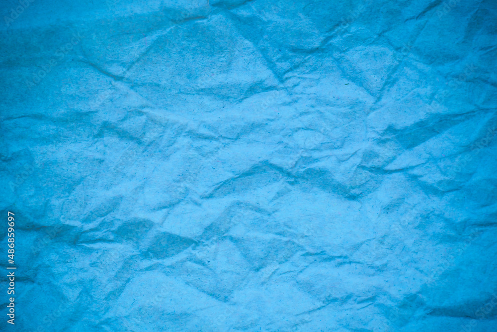Blue crumpled paper background. Blue crumpled paper background.