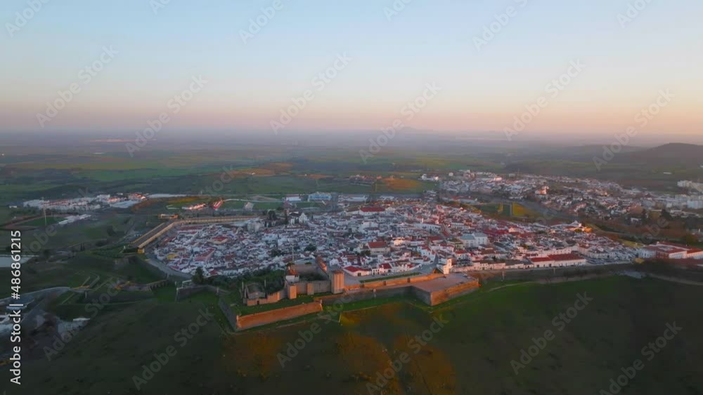 Aerial view of beautiful Elvas city with historic buildings inside fortress wall in Alentejo, Portugal Aerial view of beautiful Elvas city with historic buildings inside fortress wall in Alentejo, Portugal