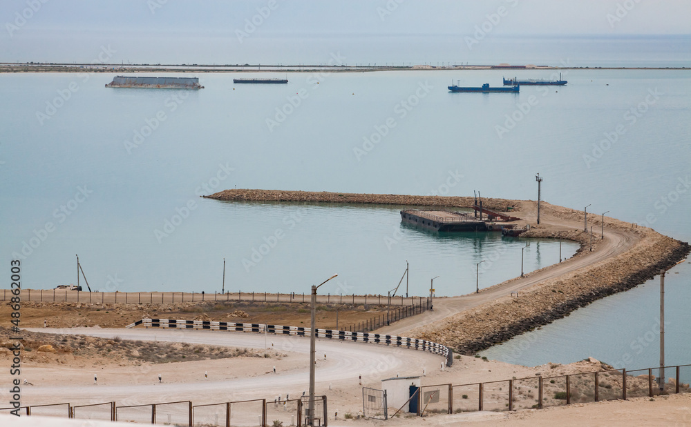 Oil tanker ships seaport.Oil loading terminal. Pier and road. Caspian sea, Bautino bay, Kazakhstan.