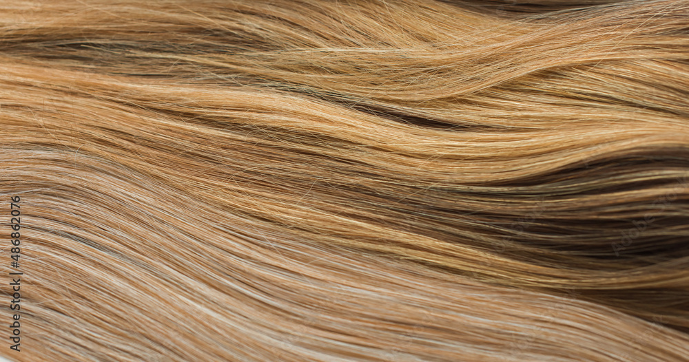 Naklejka premium Wigs, natural and synthetic hair. Women's beauty concept. Close up photo of wig, hair for ladies