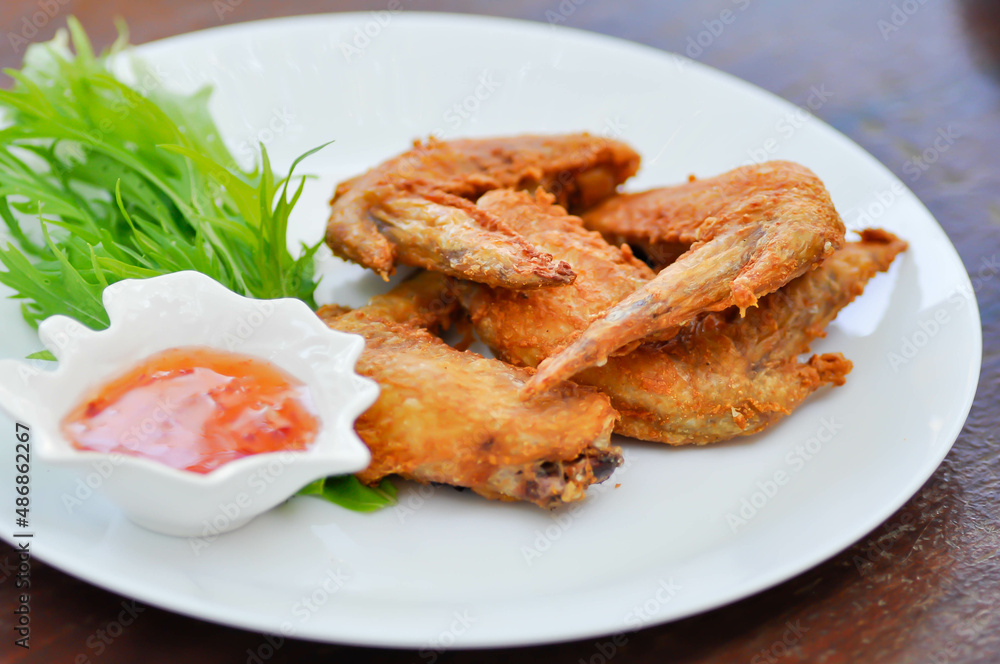 deep fried chicken , fried chicken or chicken wings deep fried chicken , fried chicken or chicken wings