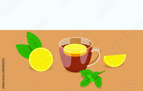 Glass cup of tea with lemon