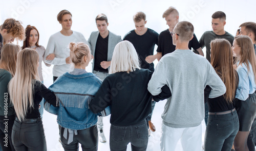 group of different young people standing in a circle © ASDF