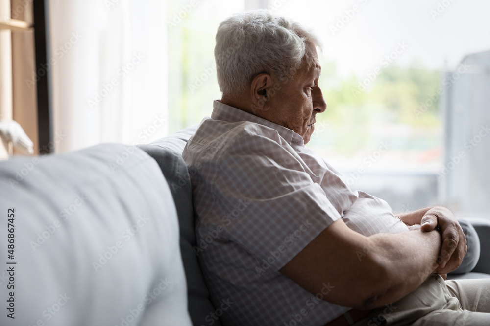Wall Mural Sad pessimistic old senior man feeling depressed, lonely, apathy, boredom, getti