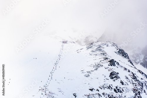 The cable car with ski tourist at Skalnate Pleso mountain, Slovakia Hight Tatras. photo