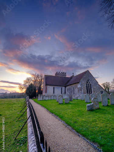 Sunset over St Peter's Church, Soberton, Hampshire, UK photo