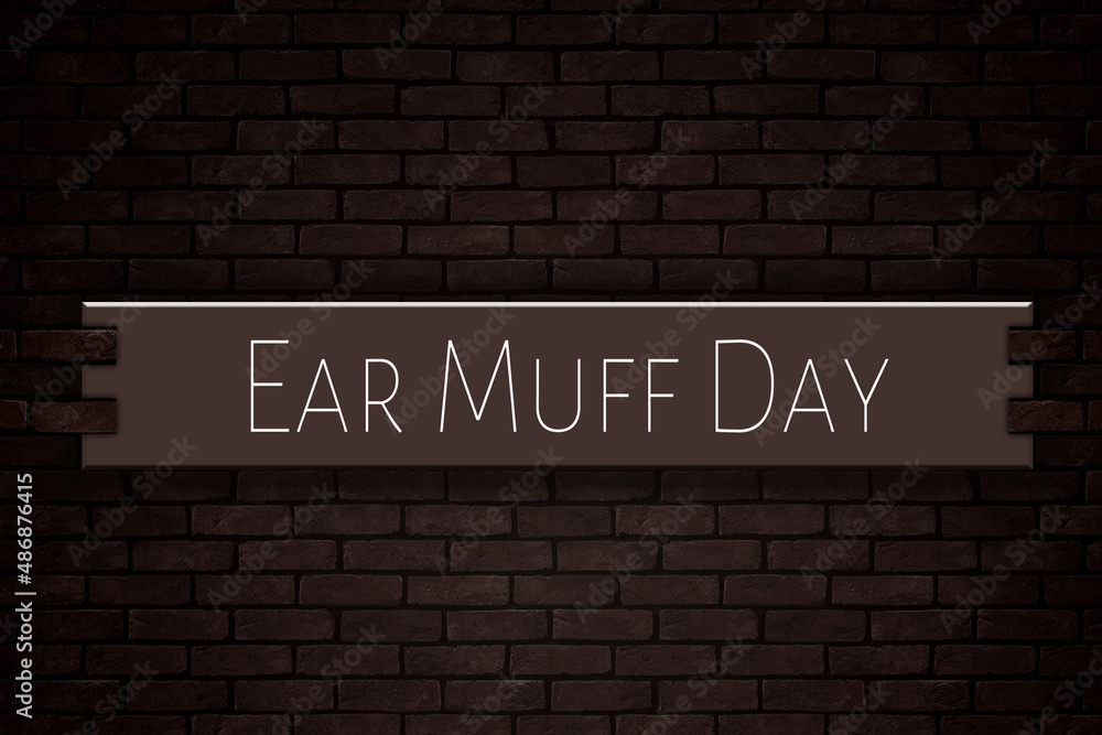 March month, day of March. Ear Muff Day, on Bricks Background March month, day of March. Ear Muff Day, on Bricks Background