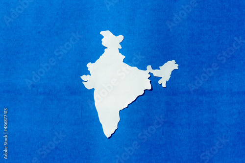 Paper cut India map isolated on Blue background.