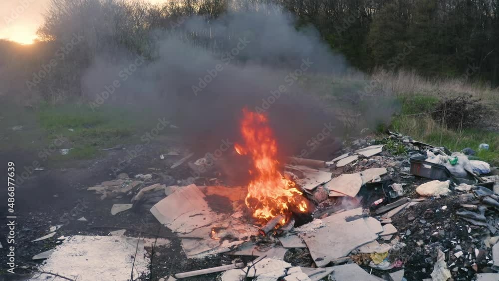 The burning of plastic debris gives off a huge amount of toxic carcinogens, not decompose in nature. Low production culture does not process polymers for a second time. Drone flying video. The burning of plastic debris gives off a huge amount of toxic carcinogens, not decompose in nature. Low production culture does not process polymers for a second time. Drone flying video.