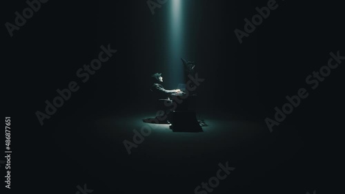 Cyberspy in an anonymous mask typing on the keyboard and attacking system data on a computer in the darkness during a cybercrime at night