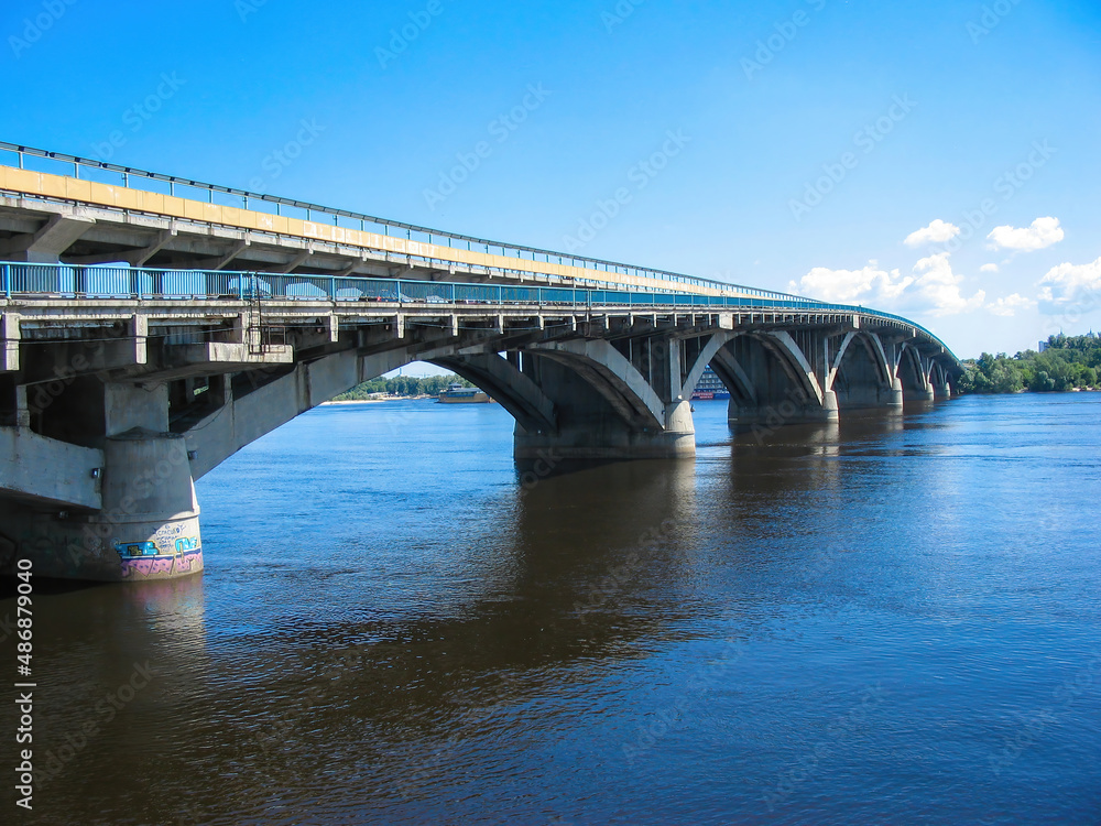 Bridge across the river for cars. 