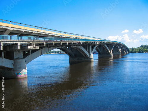 Bridge across the river for cars. 