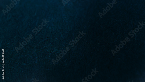 Dark blue abstract background with textured effect. 