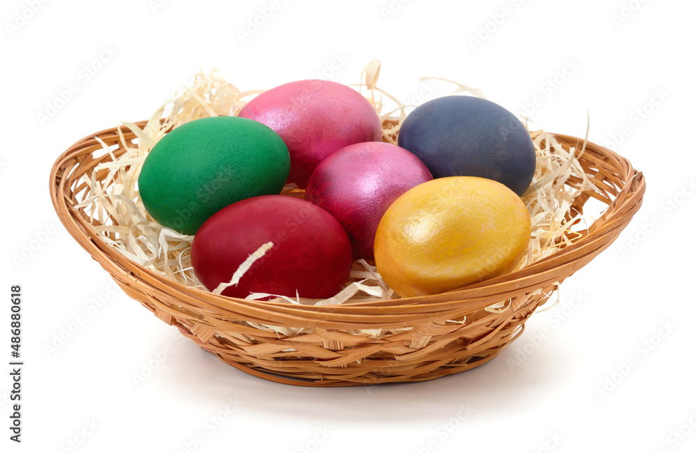 Naklejka premium Easter eggs in a basket.
