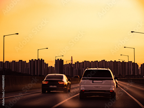 sunset on the road in the city center