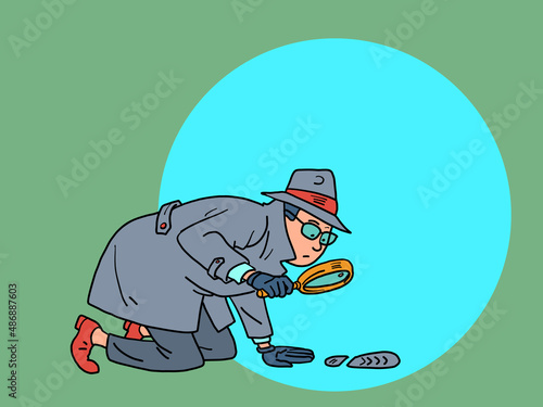 A detective with a magnifying glass examines the tracks. a private detective, a man in a coat, hat and glasses