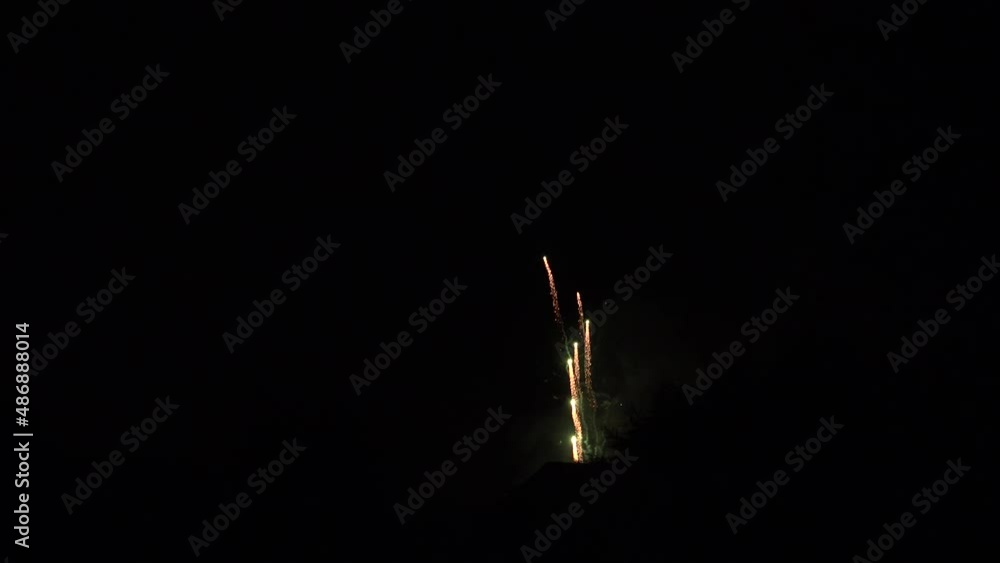 Fireworks in urban Manchester with street lights and cars passing England UK 4K Fireworks in urban Manchester with street lights and cars passing England UK 4K