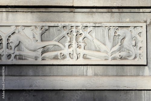 Sculpted Seahorses and Swords on the Facade of a Herengracht Canal Building in Amsterdam, Netherlands