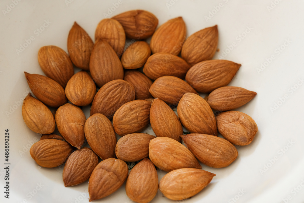 Almond background close up.Apricot kernel Almond background close up.Apricot kernel