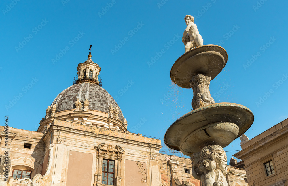 The Dome of the Saint Caterina church with sculpture of the Pretoria fountain in Palermo, Sicily, Italy