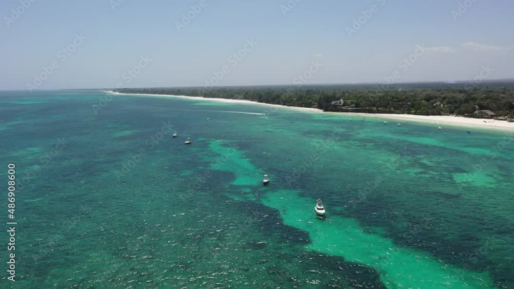 Drone Coastline Diani beach landscape Kenyan African Sea aerial 4k waves blue indan ocean tropical mombasa turquoise white sand East Africa palms paradise view Wood boats on water kite surfing Drone Coastline Diani beach landscape Kenyan African Sea aerial 4k waves blue indan ocean tropical mombasa turquoise white sand East Africa palms paradise view Wood boats on water kite surfing