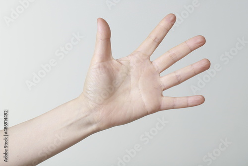 Close up of woman gesturing open hand